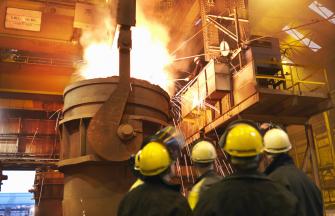 Workers in front of Blast Furnace