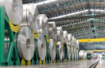 Steel rolls stacked in warehouse