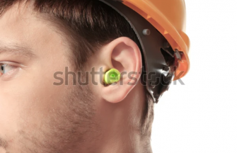Male worker with earplug on white background