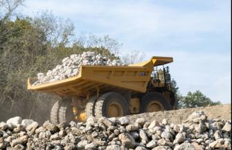 CAT Autonomous Truck operating at Drummond Island back view