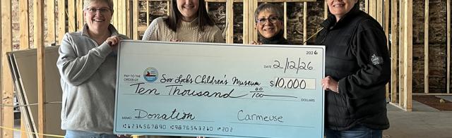 Cedarville and Drummond Island donation to Soo Locks Children's Museum