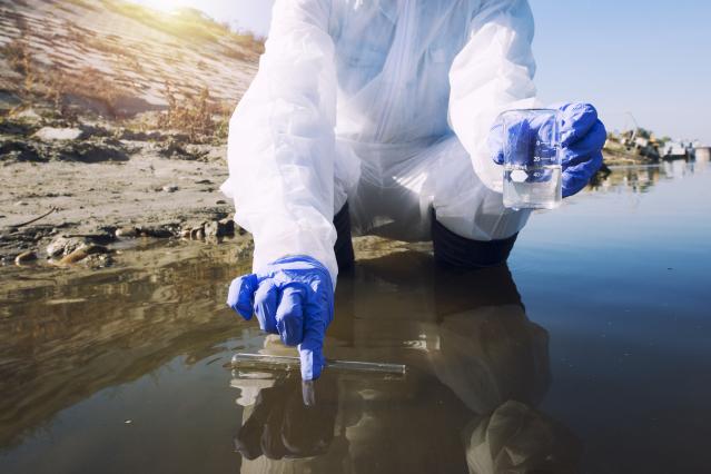 ecologist-taking-samples-water