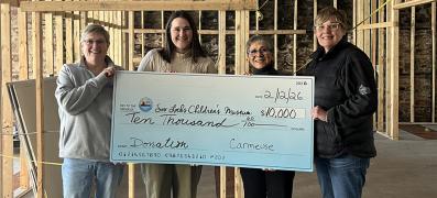 Cedarville and Drummond Island donation to Soo Locks Children's Museum
